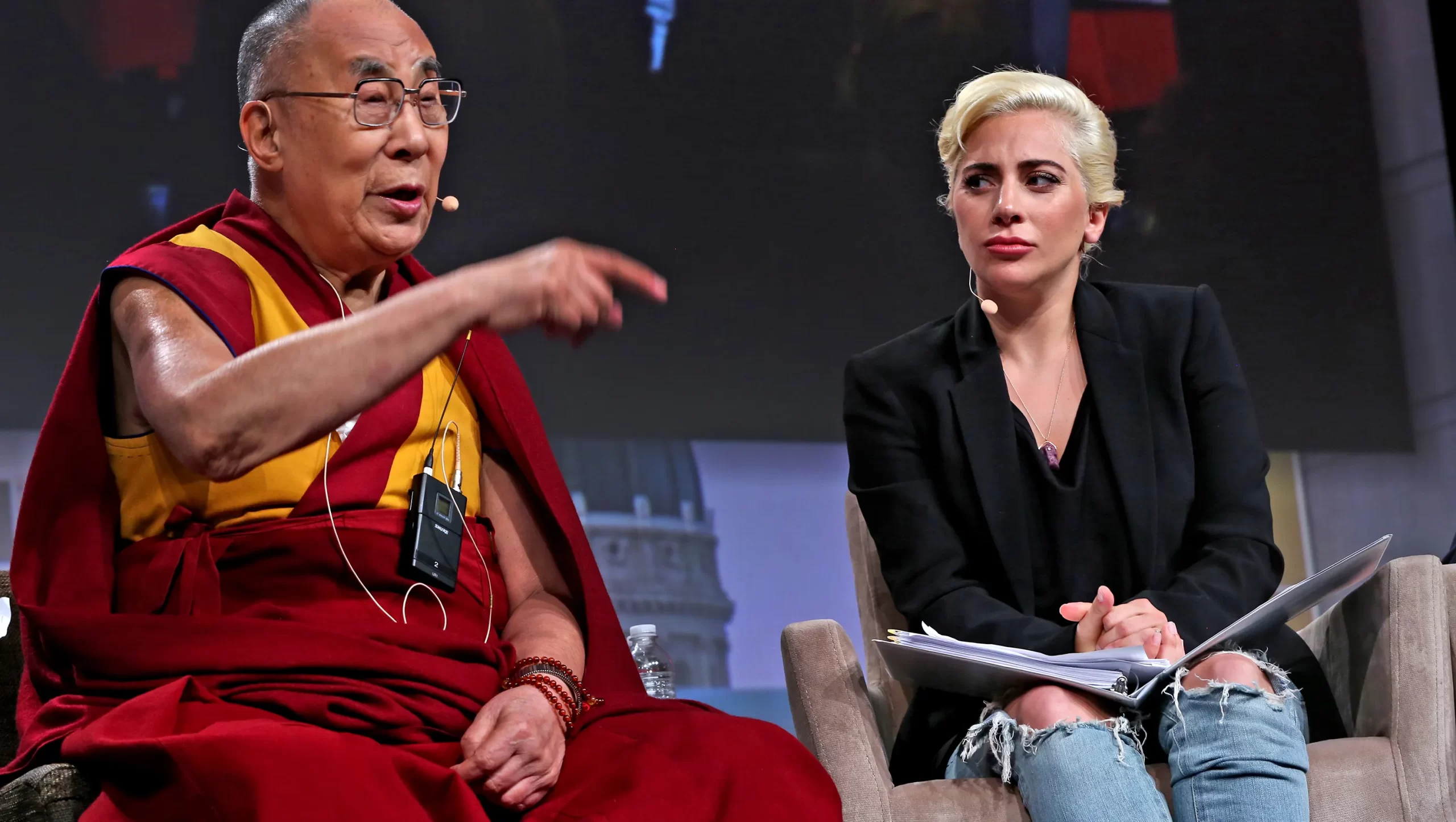 Lady Gaga Prevents Dalai Lama from Touching Her Bare Leg