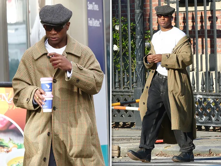 Jonathan Majors Takes a Solo Walk Without Meagan Good After Text Revelations in Trial